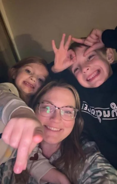 Chelsie Ivy, owner of Stitched & Branded, with her two children